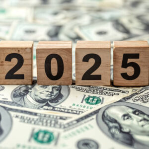 wood blocks that spell 2025 on cash